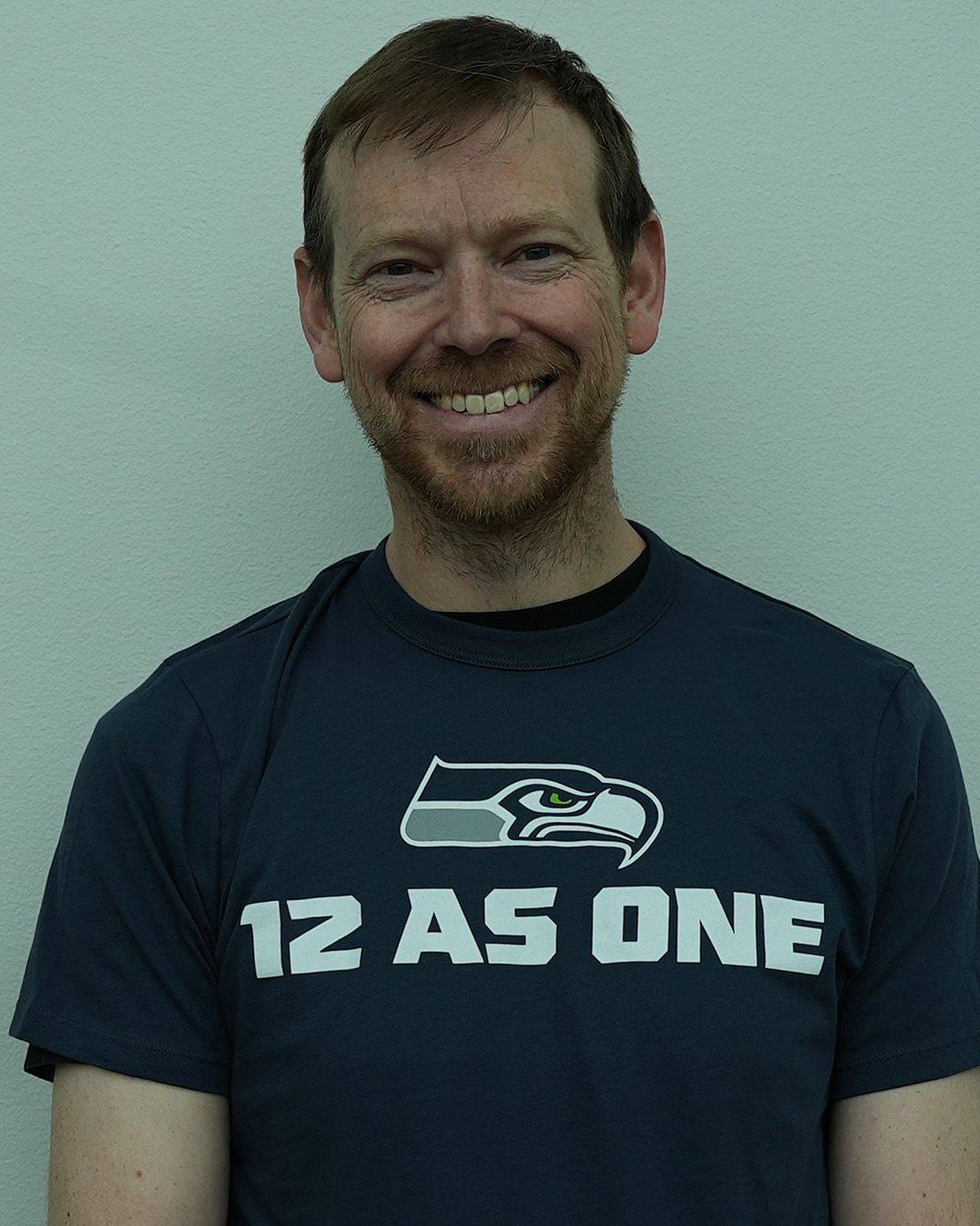 A headshot of Jon Bauman