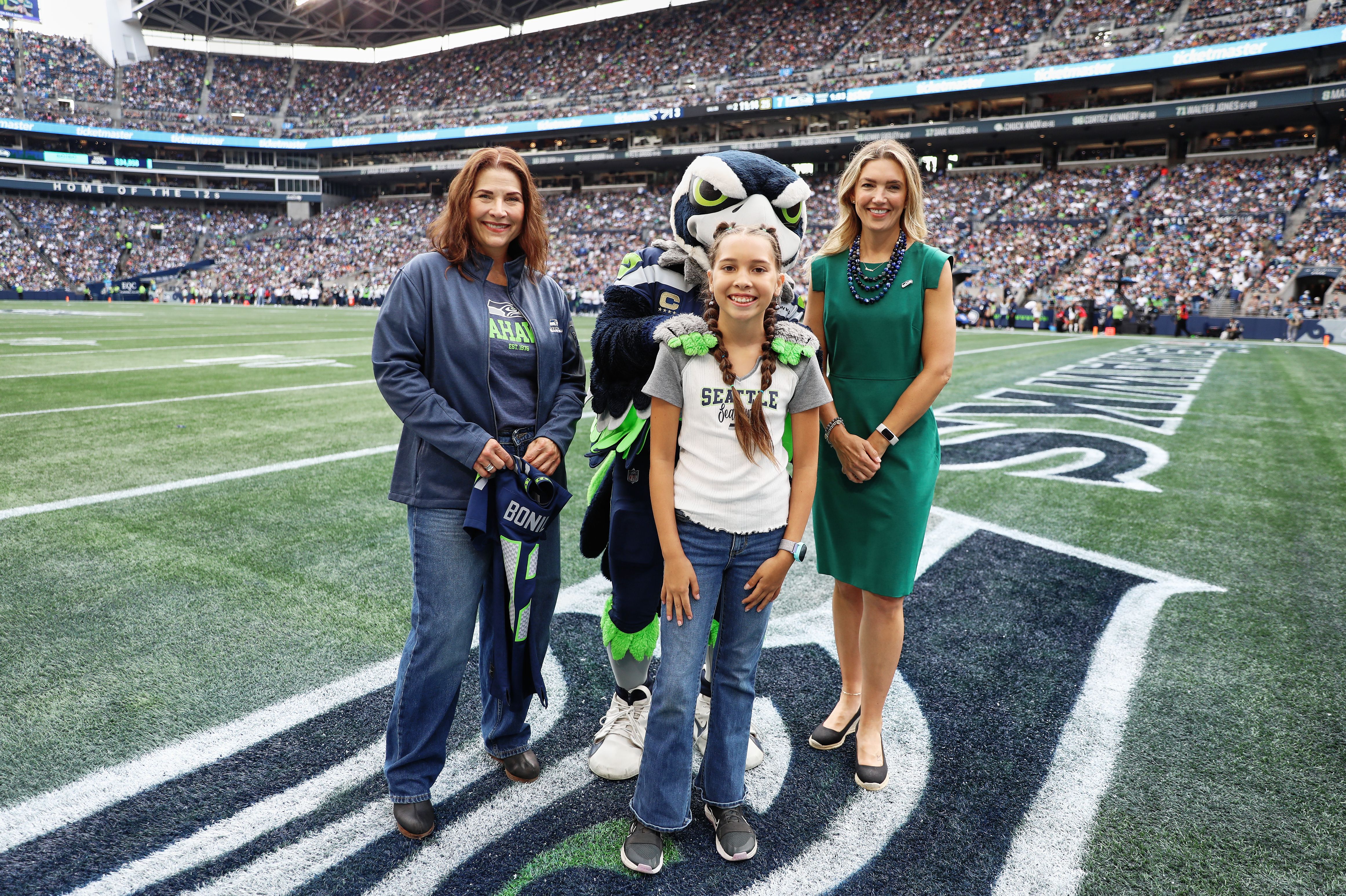 12 Pages Summer Reading Challenge winner at the 8/15 preseason game