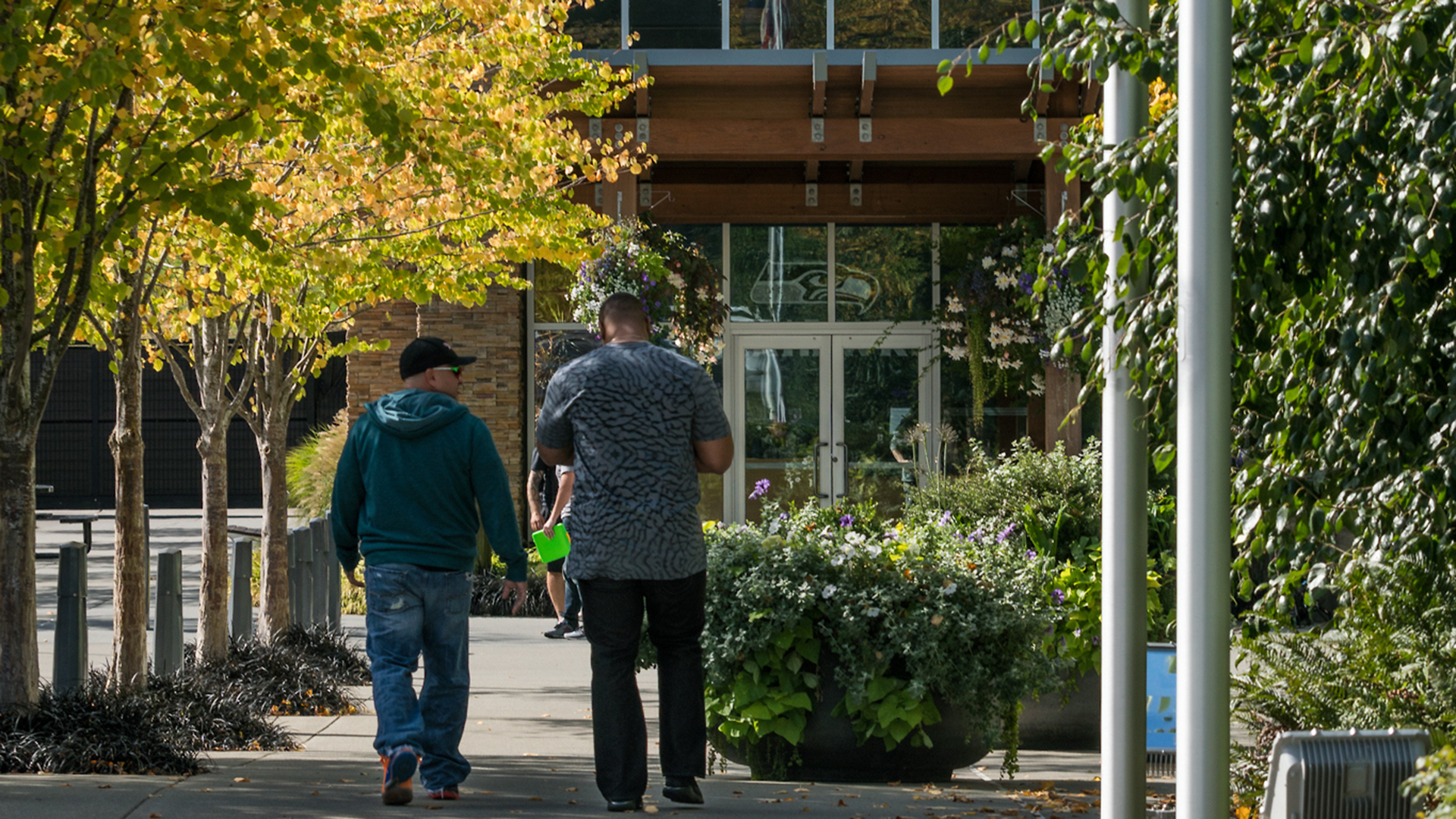 People walking outside the Virginia Mason Athletic Center