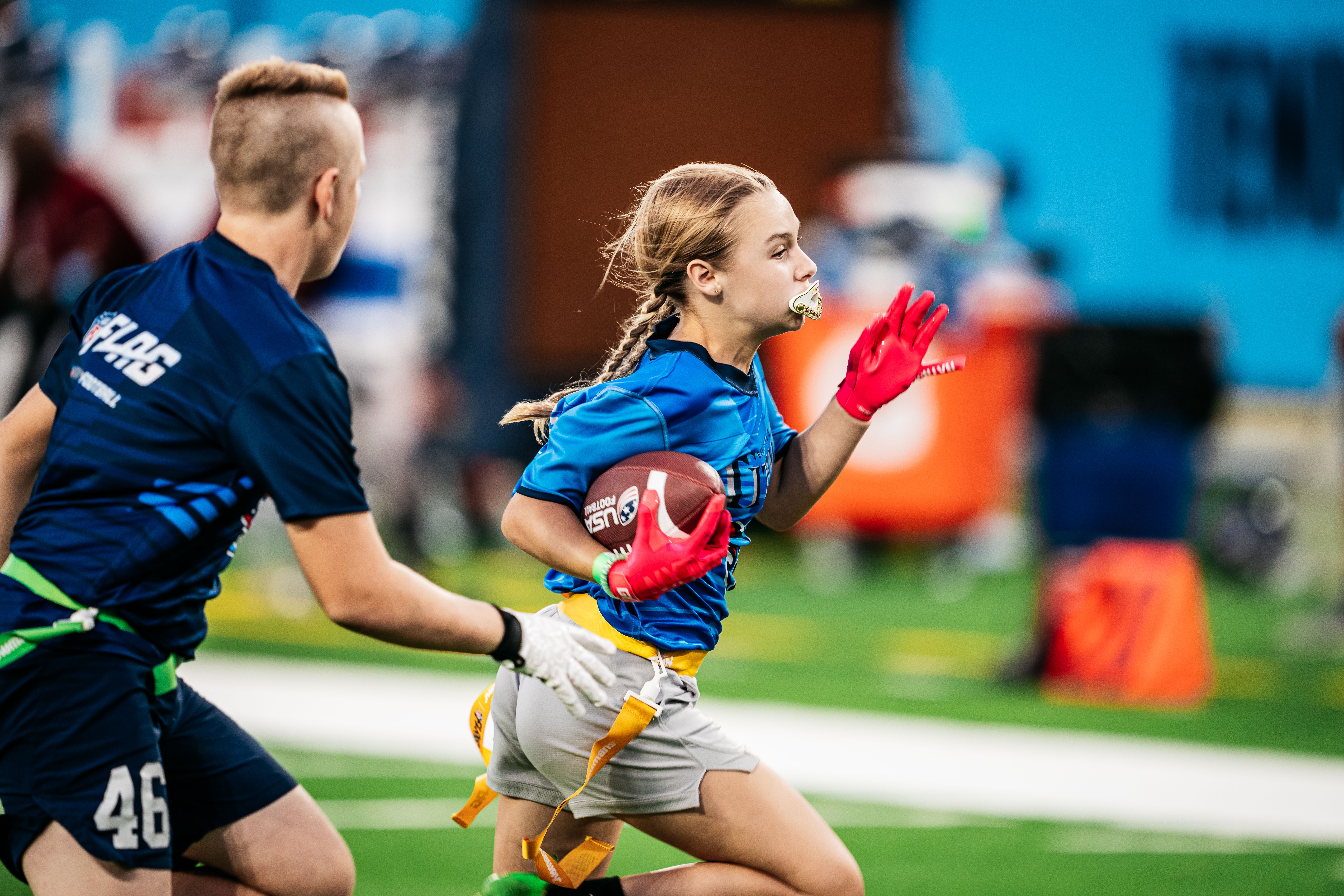 Youth participate in NFL flag football during the preseason game between the Tennessee Titans and the Seattle Seahawks at Nissan Stadium on August 17, 2024 in Nashville, TN. Photo By Joe Howell/Tennessee Titans