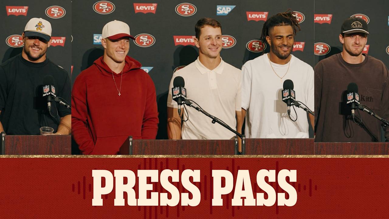 Brock Purdy and 49ers teammates at a press conference
