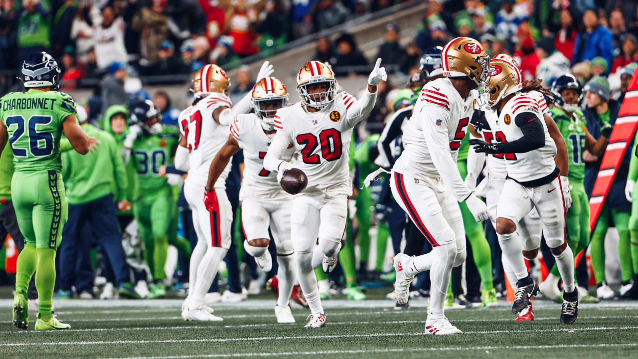 Ambry Thomas Rips the Ball Away from Lockett for an INT in Seattle