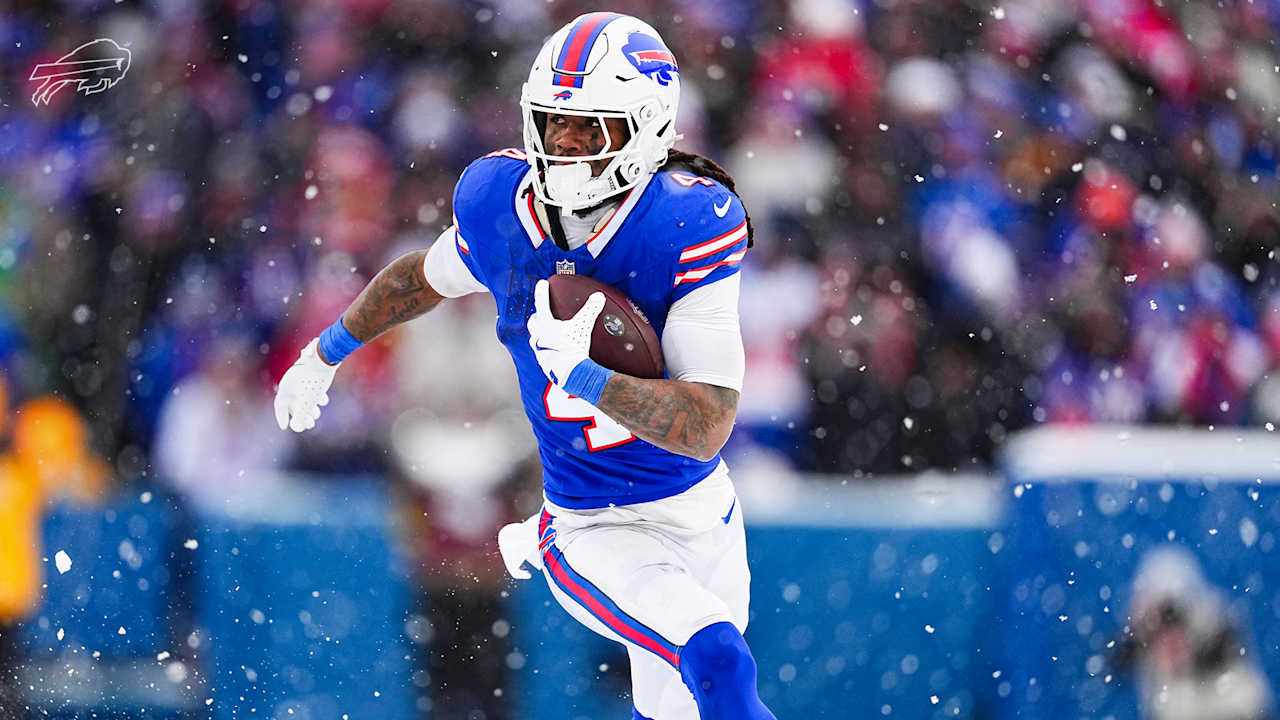 James Cook breaks off a 27-yard catch-and-run through the snow into the ...