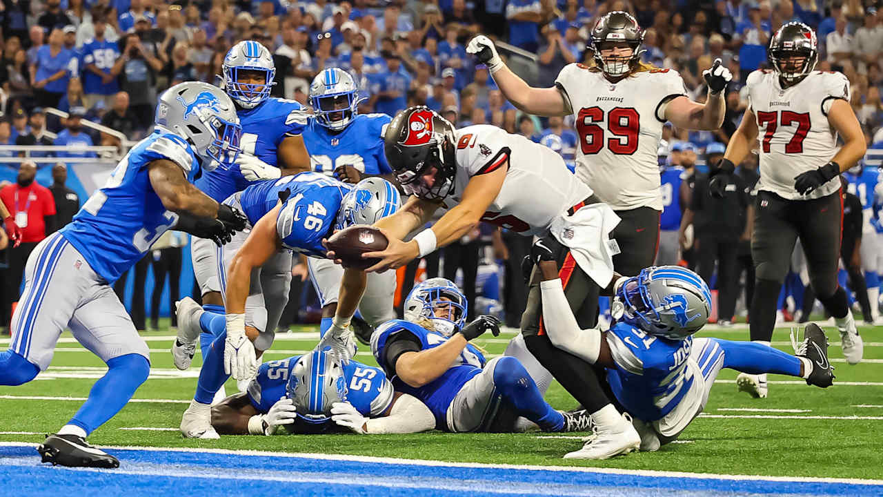 Baker Mayfield pulls the Tampa Bay Buccaneers across the finish line in Detroit with his legs