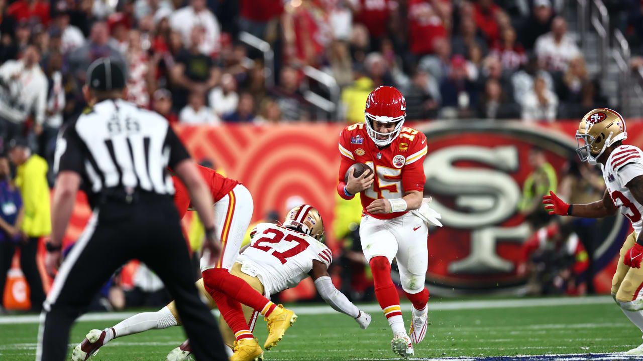 Kansas City Chiefs quarterback Patrick Mahomes keeps it himself on 22-yard rush into San Francisco 49ers' territory in Super Bowl LVIII