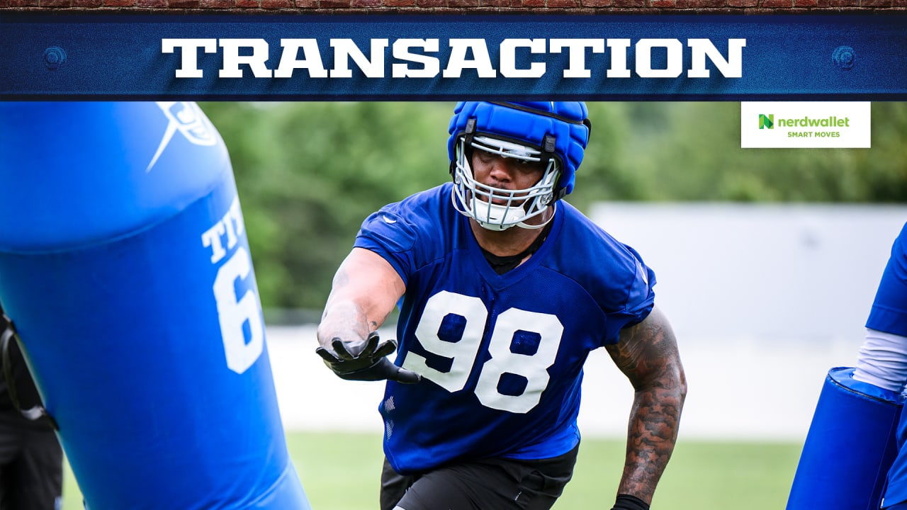 Colts activate DT Raekwon Davis from active/non-football ailments list, sign C Mike Panasiuk and LB Mike Smith Jr.; place C Ryan Coll on injured list, release injured G Josh Sills