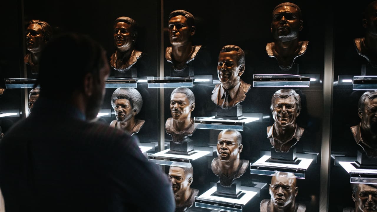 For Julius Peppers, his first steps inside the Pro Football Hall of Fame were solemn ones