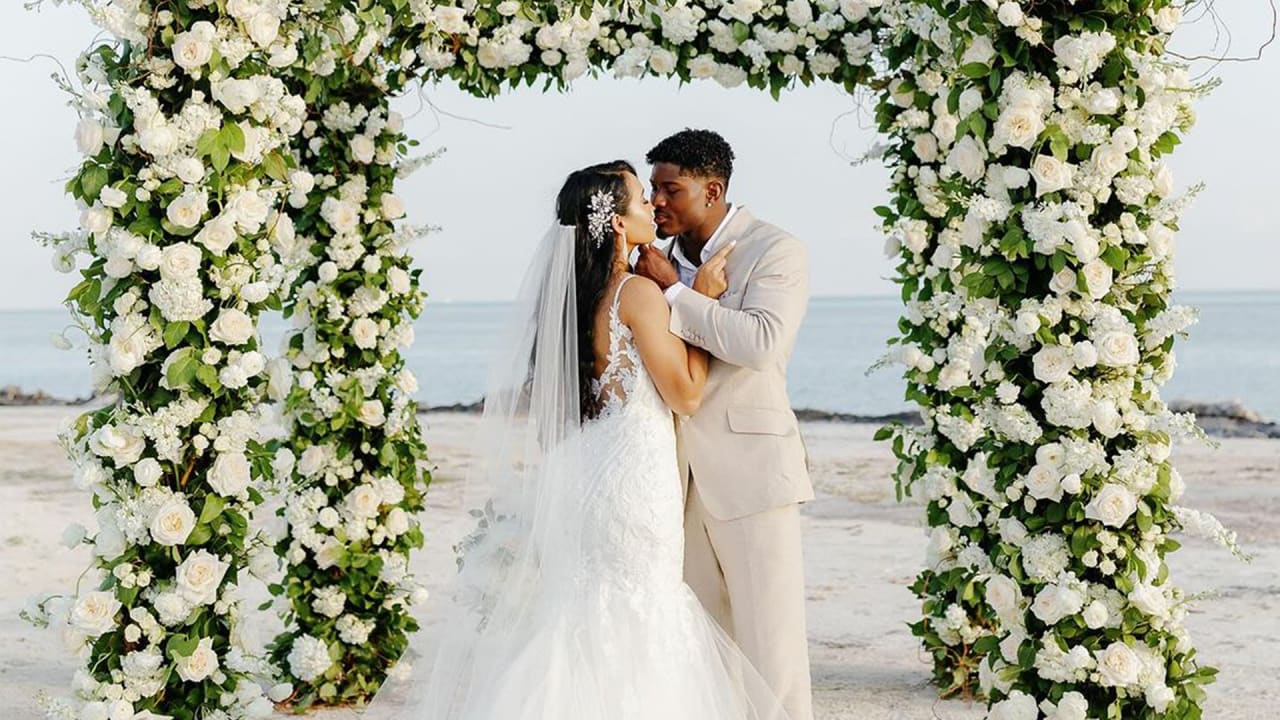 Jonathan Jones, new wife Andressa share stunning photos from island wedding