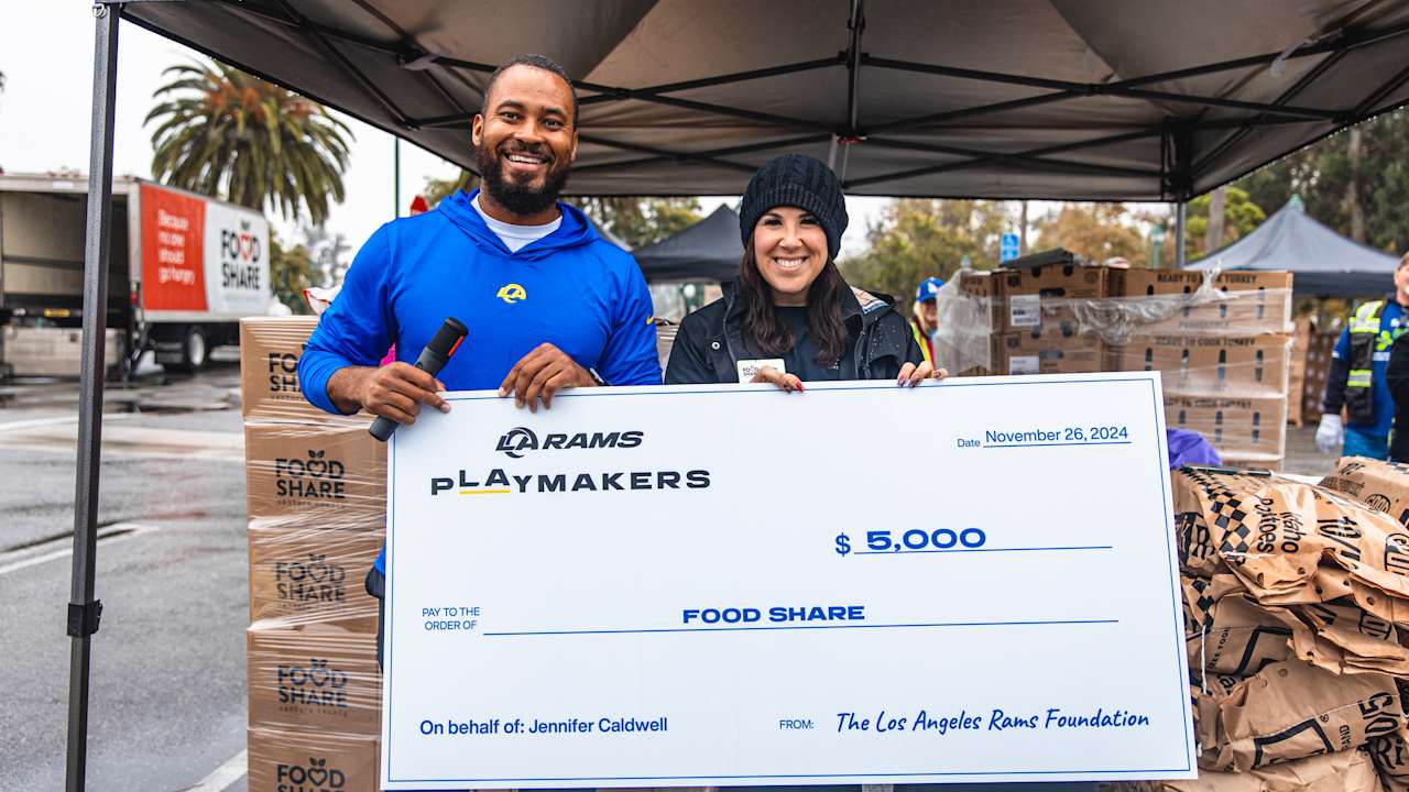 Rams surprise Food Share’s Chief Development Officer Jennifer Caldwell ...