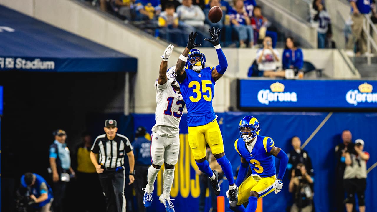 Cornerback Jaylen Watson intercepts a pass by Bills quarterback Josh ...