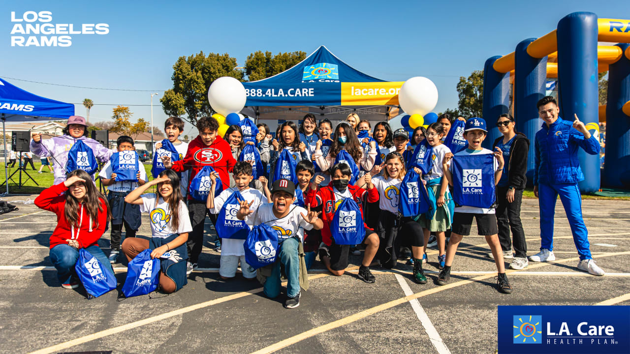 COMMUNITY PHOTOS: Rams & L.A. Care team up to give students at Broad ...
