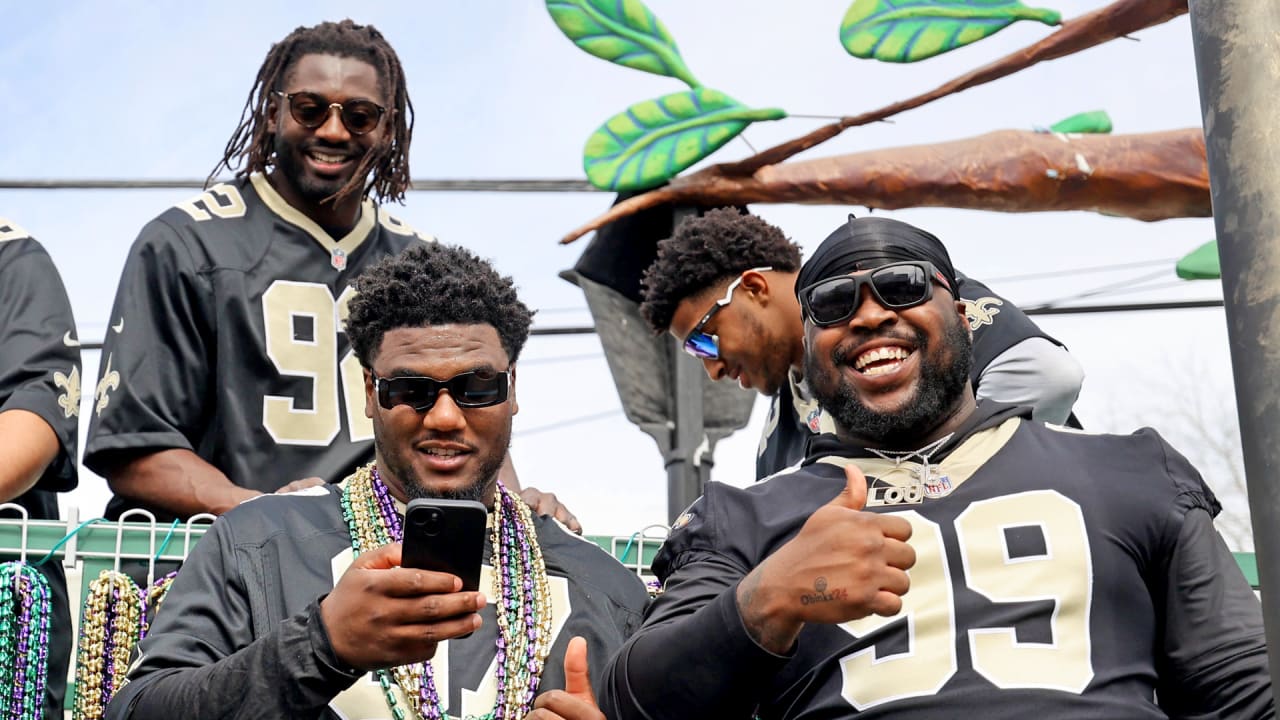 Photos Saints players ride in Krewe of Tucks parade during Mardi Gras 2024