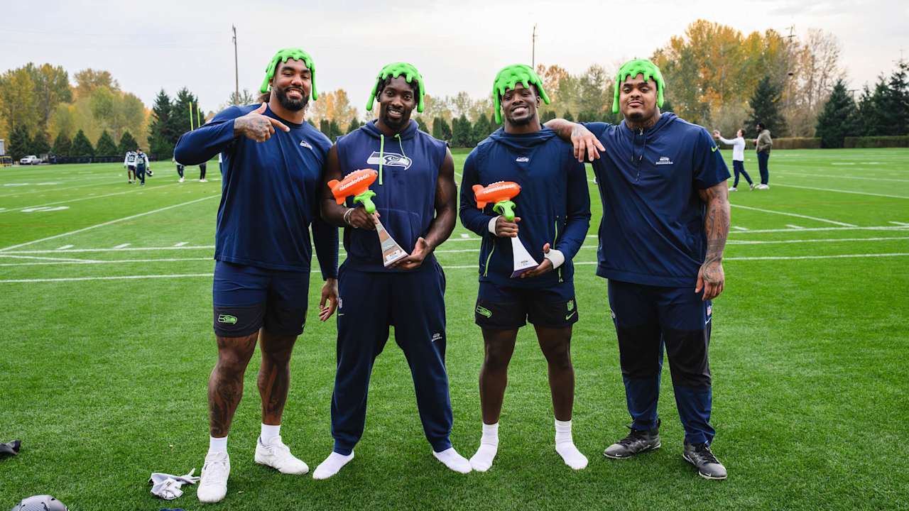 DeMarcus Lawrence And Tyrice Knight Get Slimed After Being Awarded The NVP Award For Week 10