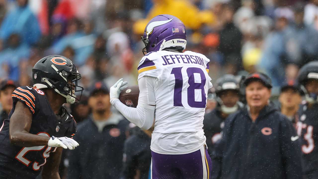 Justin Jefferson carrying the ball for Minnesota