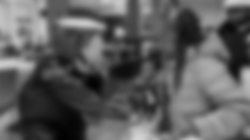 In the midst of the holiday season, the Bears brought joy to 50 Leo High School families in the Auburn Gresham neighborhood Tuesday night with Bears Care's annual “Bears Bearing Gifts” initiative, which provides families on the city’s South Side with Christmas gifts for kids, household essentials, gas and grocery gift cards and a festive evening with their community.