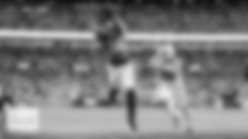 Take a closer look at the Broncos' Week 15 win over the Green Bay Packers with these distinctive images made by Broncos team photographers.