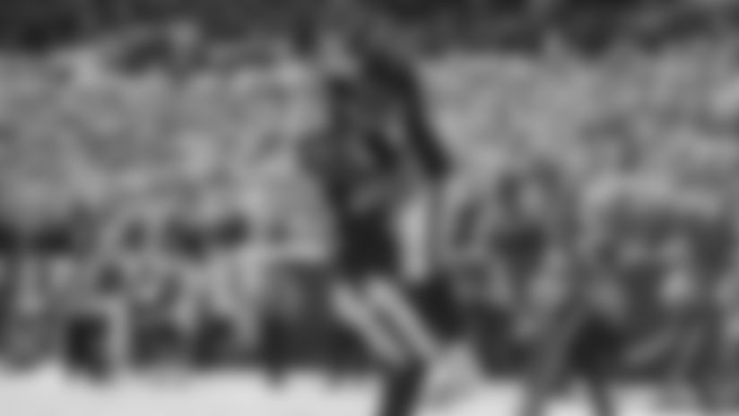 T Tristan Wirfs catches a touchdown from QB Baker Mayfield against the Arizona Cardinals in Week 13 of the 2025 NFL season.