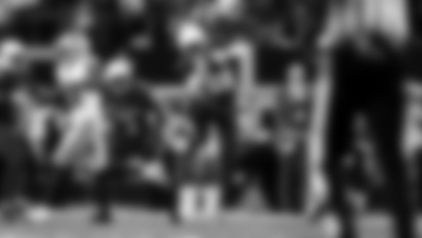 Cardinals CB Denzel Burke intercepts Dak Prescott to ice the game against the Dallas Cowboys.