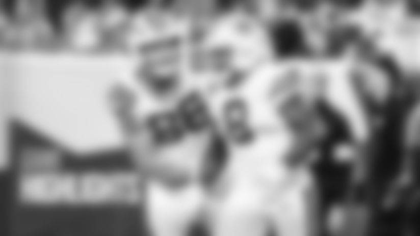 Green Bay Packers RB Josh Jacobs breaks off a 40-yard rush to score during Sunday's Week 15 game against the Denver Broncos.