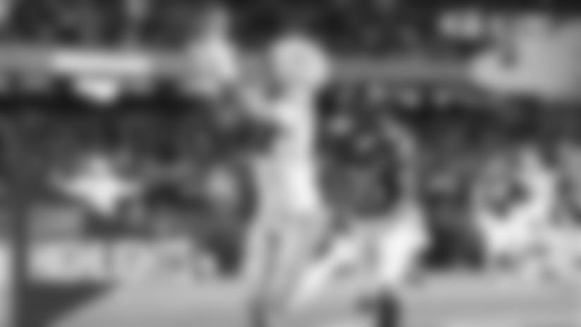 Green Bay Packers WR Romeo Doubs hauls in a 33-yard touchdown pass from QB Malik Willis during Saturday's Week 16 game against the Chicago Bears.