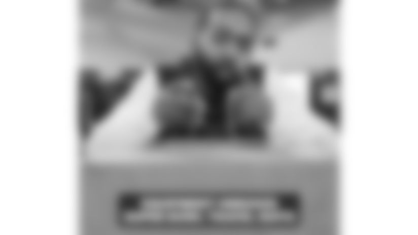 Watch as the Patriots equipment staff unboxes the team's travel suits.