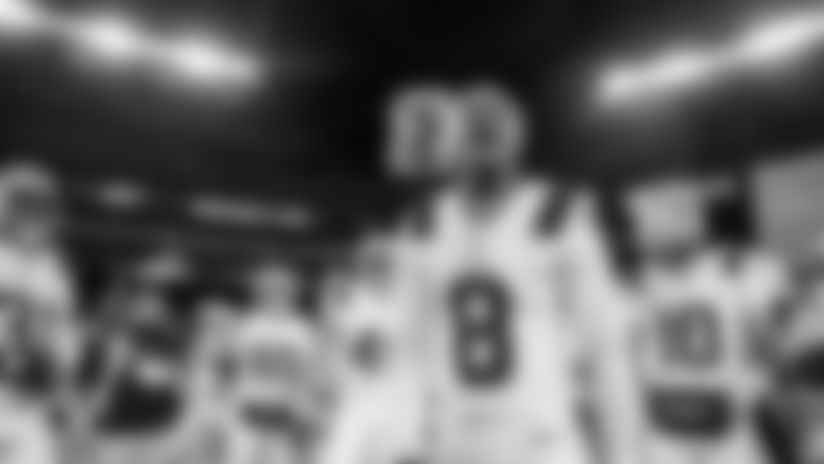 Patriots wide receiver Stefon Diggs leads the team huddle prior to New England's Week 16 game against the Baltimore Ravens.