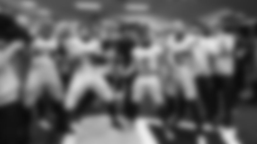 The Seahawks celebrated the 38-37 overtime-win vs. the L.A. Rams in Week 16. Check out the best postgame celebration photos.