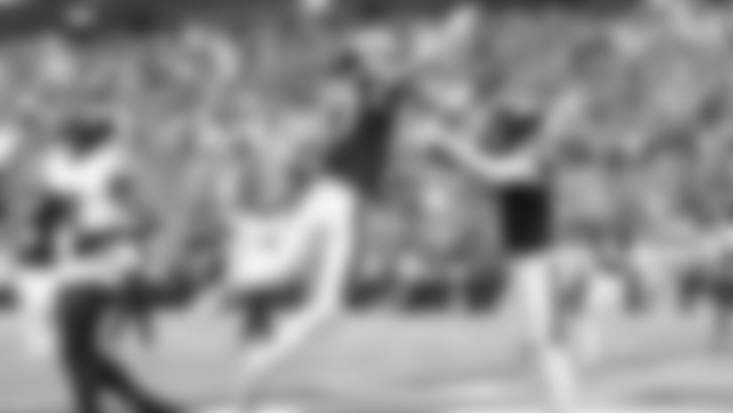 View game action photos from the Vikings vs. Commanders Week 14 game at U.S. Bank Stadium.