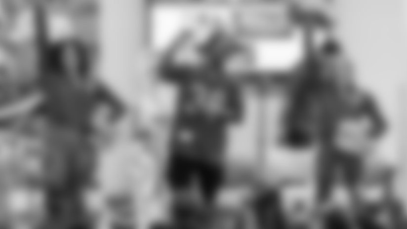 View photos of the Tampa Bay Buccaneers and Dr. Seuss Enterprises celebrating National Reading Month at Potter Elementary School.