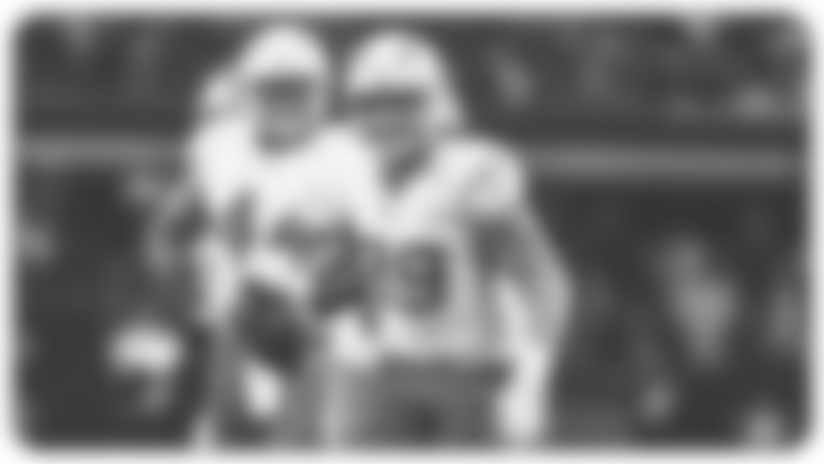 Quarterback Justin Herbert finds tight end Will Dissly off of play action for a 15-yard gain.