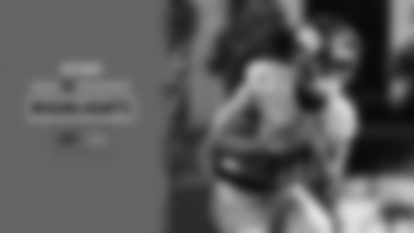 Seattle Seahawks wide receiver Jaxon Smith-Njigba catches a 20-yard pass from quarterback Sam Darnold during Thursday's divisional matchup with the Los Angeles Rams.