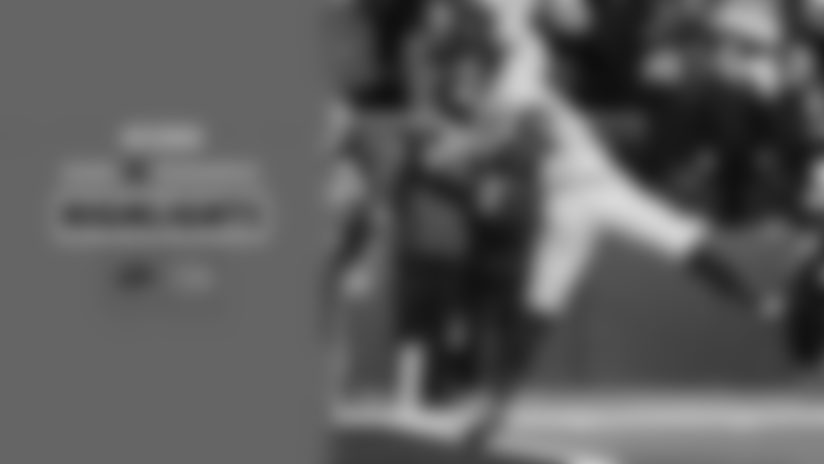 Seattle Seahawks quarterback Sam Darnold lofts a 26-yard touchdown pass to tight end AJ Barner in Week 16 against the Los Angeles Rams at Lumen Field.