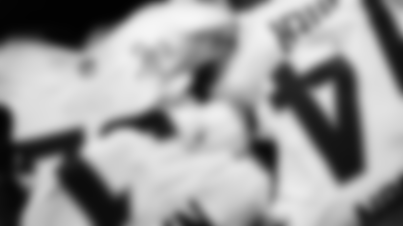 View photos of the Vikings equipment staff getting the team's Winter Warrior uniforms ready for the Winter Whiteout game against the Lions on Christmas Day.