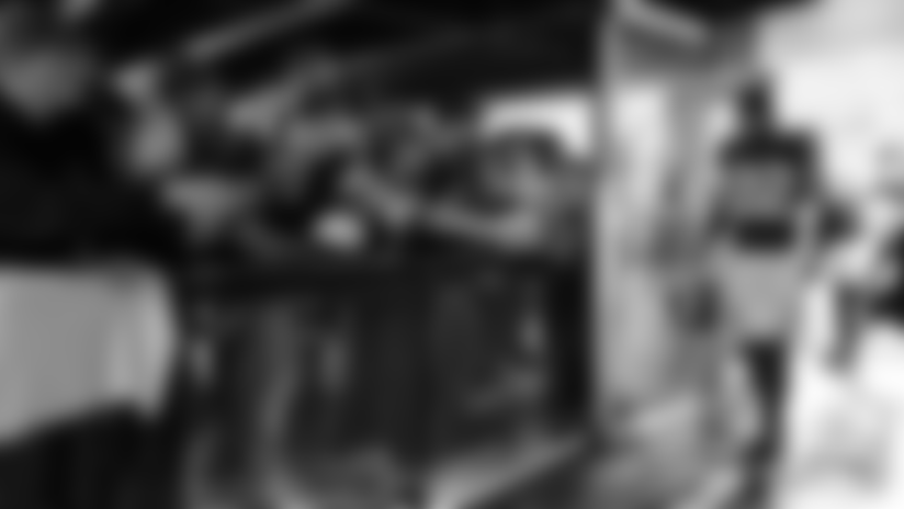 View locker room celebration photos from the Vikings 16-3 win over the Packers at U.S. Bank Stadium in Week 18.