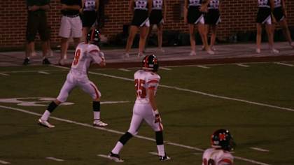 No. 9 George Kittle and No. 25 Brandon Minto during a Norman High School football matchup.