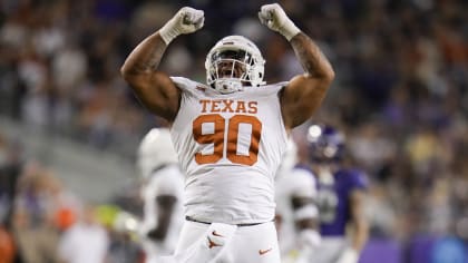 Texas defensive lineman Byron Murphy II reacts after collecting a sack against TCU during the first half of an NCAA college football game, Saturday, Nov. 11, 2023, in Fort Worth, Texas. (AP Photo/Julio Cortez)