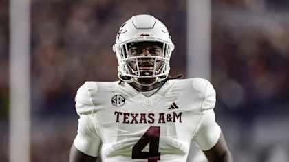 Texas A&M's Shemar Stewart (4) warms up prior to an NCAA college football game against Auburn, Saturday, Nov. 23, 2024, in Auburn, Ala. (AP Photo/Stew Milne)