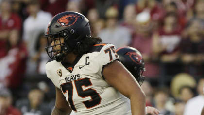 FILE - Oregon State offensive lineman Taliese Fuaga follows a play during the second half of an NCAA college football game against Washington State, Saturday, Sept. 23, 2023, in Pullman, Wash. Fuaga has been selected to The Associated Press midseason All-America team, Wednesday, Oct. 18, 2023. (AP Photo/Young Kwak, File)