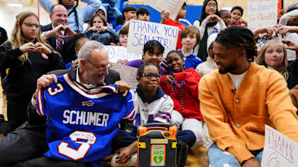 Damar Hamlin and U.S. Senate Majority Leader Chuck Schumer announce the HEARTS Act, December 09, 2024 at Cheektowaga Central High School.