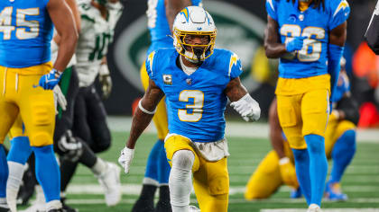 Derwin James Jr. #3 of the Los Angeles Chargers forces a fumble