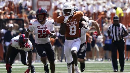 Texas running back Xavier Worthy (8) runs for a touchdown against Texas Tech during the second half of an NCAA college football game on Saturday, Sept. 25, 2021, in Austin, Texas. (AP Photo/Chuck Burton)