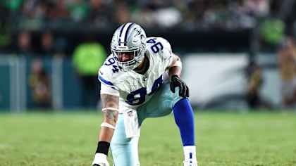 Dallas Cowboys defensive end Marshawn Kneeland (94) lines up before a play during an NFL football game against the Philadelphia Eagles, Thursday, Sept. 4, 2025 in Philadelphia. (Kevin Sabitus via AP)