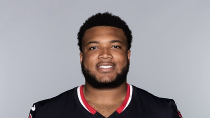 Houston Texans rookie offensive tackle Blake Fisher blocking in a game