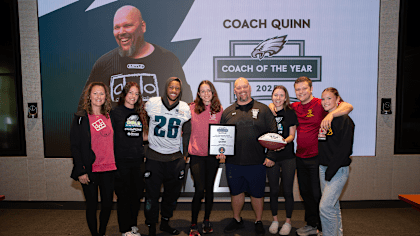 Saquon Barkley with the Quinn family.