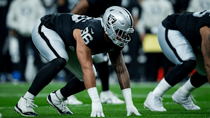 Raiders defensive tackle Jonah Laulu in game uniform