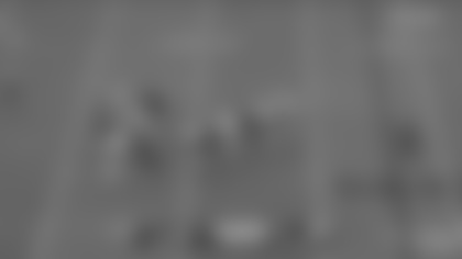 Bears defensive back C. J. Gardner-Johnson bursts into the backfield to pressure Eagles quarterback Jalen Hurts to force an incompletion on third down.