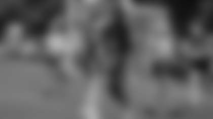 Sophomore wide receiver Cora Quilty celebrates a catch with sophomore Leighton Hormuth.