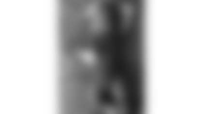 Della Jo Bear dressed in Bears clothes as a baby.