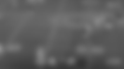 Bears quarterback Caleb Williams escapes the Green Bay Packers pass rush and scrambles for a 12-yard gain on fourth down.