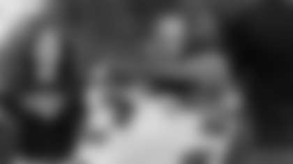 Valerie Spann embraces Arden Rubenstein on Senior Night.